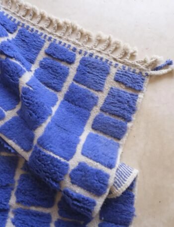 Designer checkerboard wool rug